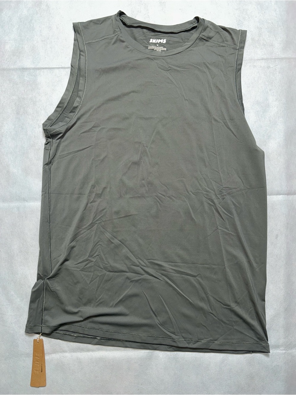 Skims sport slim muscle tank in gunmetal NWT size medium